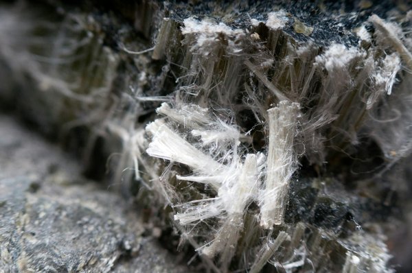 How to identify and manage asbestos risk in older UK properties?